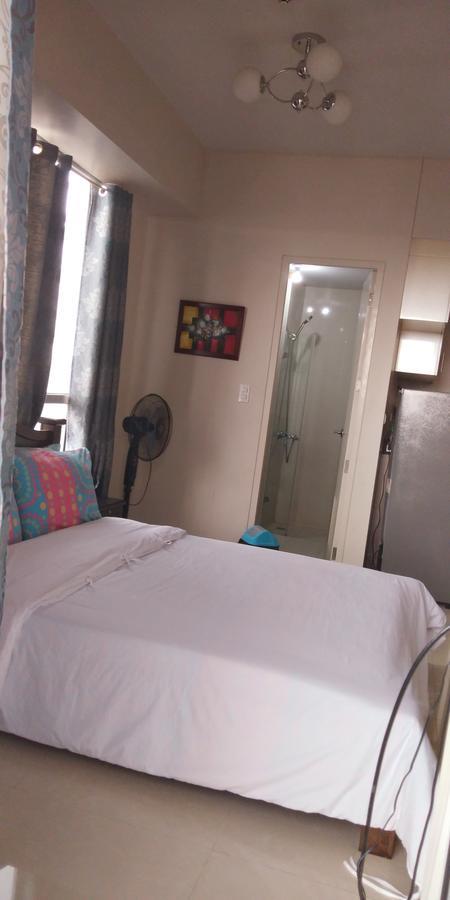 Palm Tree Genlex Condo Manila Esterno foto